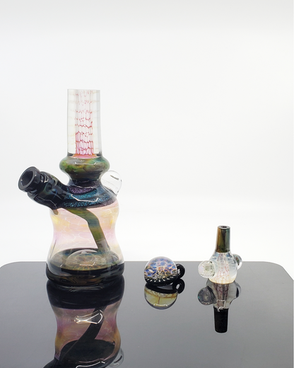 View of the 3-hole percolator inside the Kenan Tiemeyer Mini Tube, designed for smooth filtration and functionality.