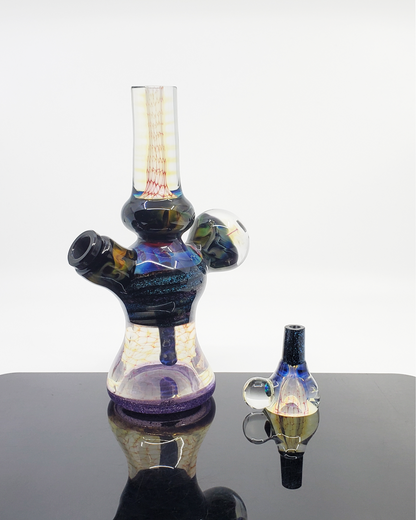  Kenan Tiemeyer Minitube in use, demonstrating its craftsmanship and efficient functionality for smoking enthusiasts.