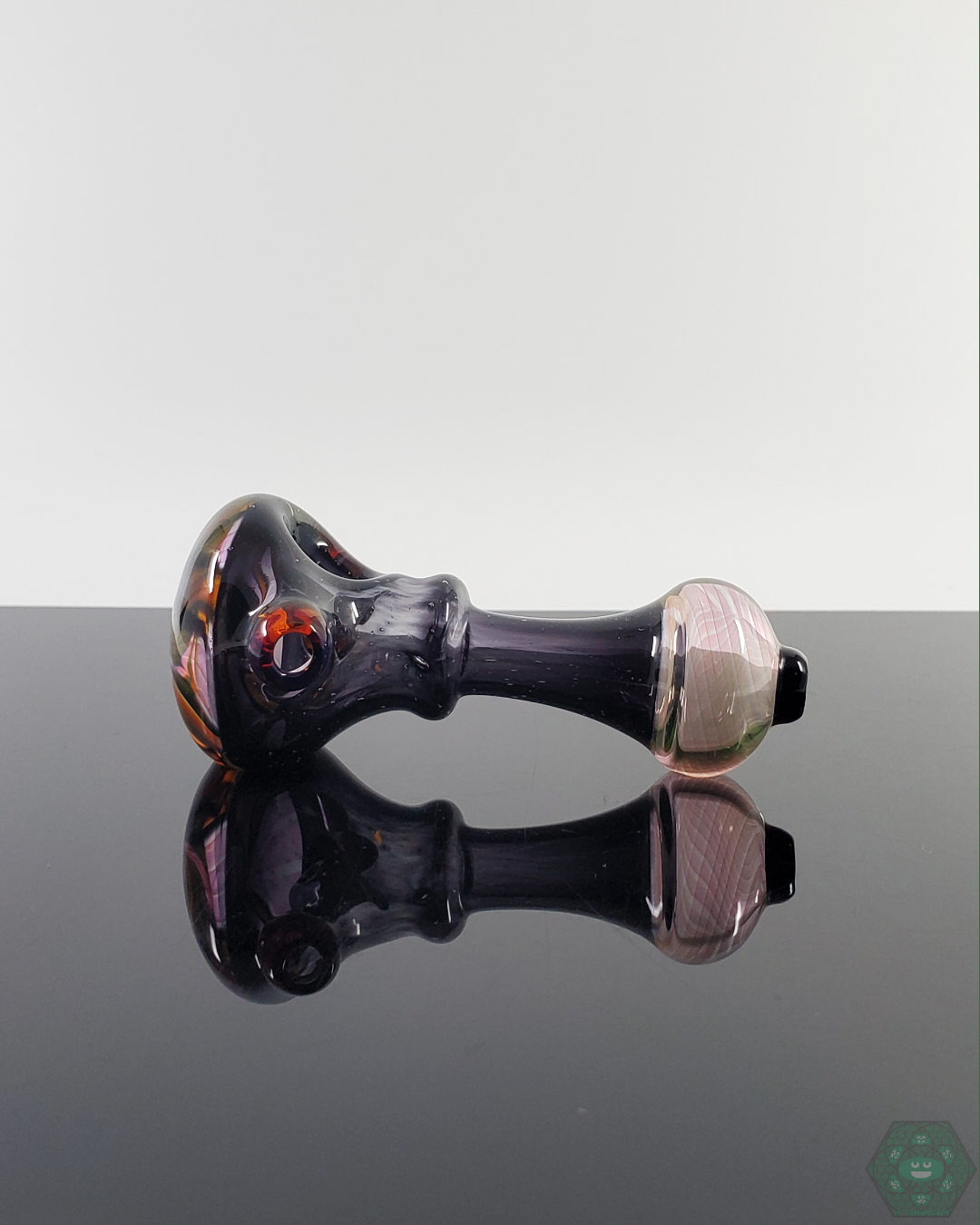 LQL Glass Fumed Multi-Section Spoon featuring color-changing fumed glass with an artistic multi-section design