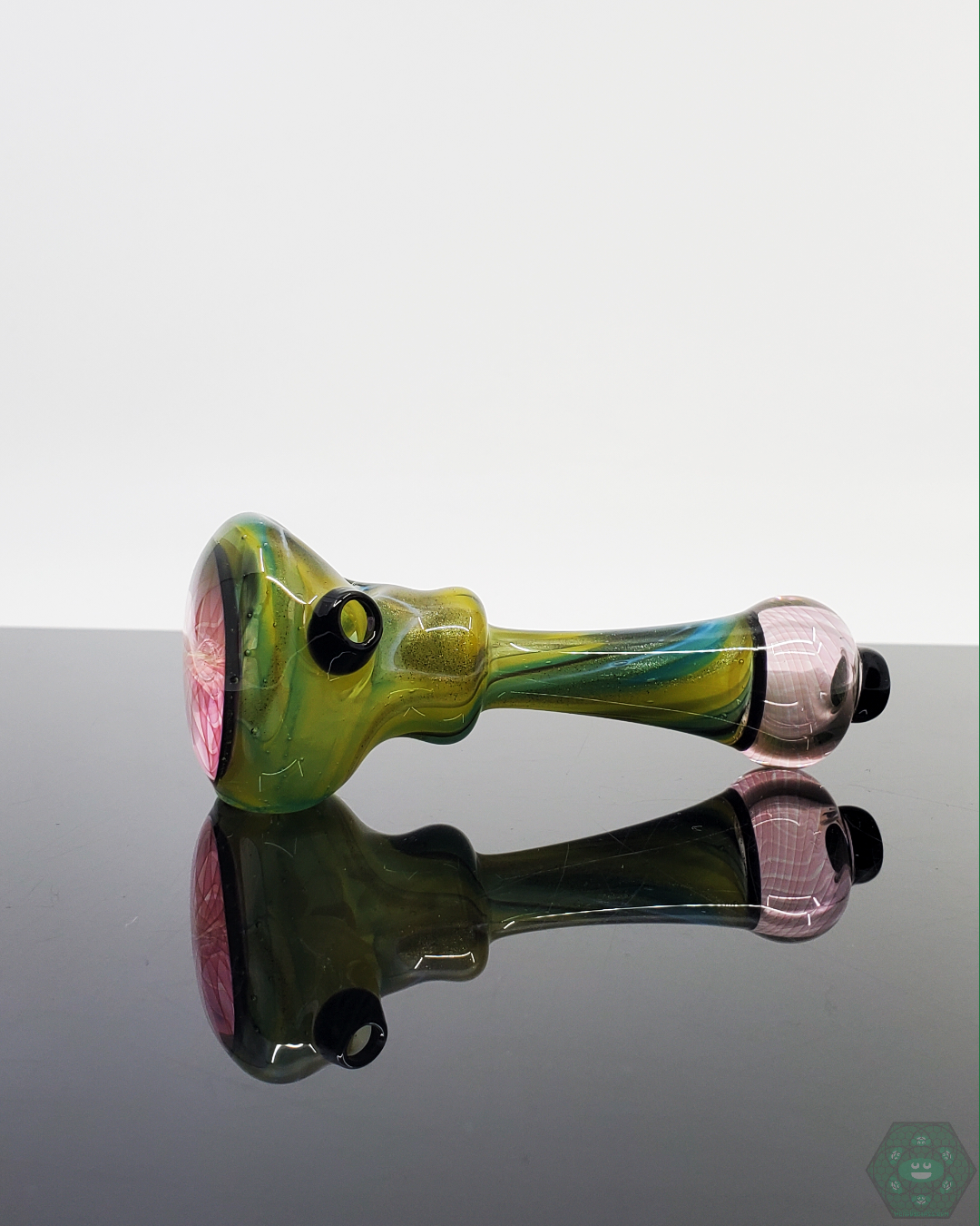  LQL Glass Fumed Multi-Section Spoon in a lifestyle setting, perfect for stylish and portable smoking sessions.