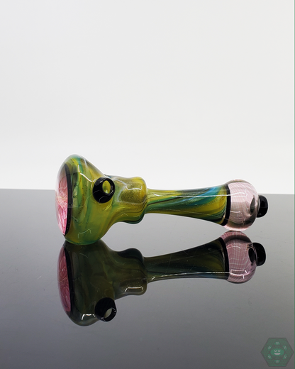  LQL Glass Fumed Multi-Section Spoon in a lifestyle setting, perfect for stylish and portable smoking sessions.