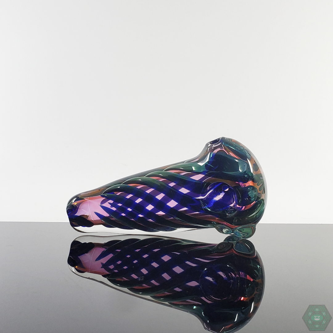 Top-down view of the LQL Glass Fumed Multi-Section Spoon, displaying its unique sectioned design and smooth airflow.