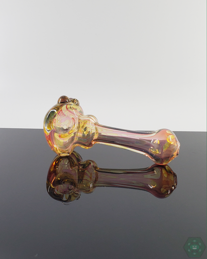  Close-up of the LQL Glass Fumed Spoon, highlighting the unique color-changing effect of the fumed glass.