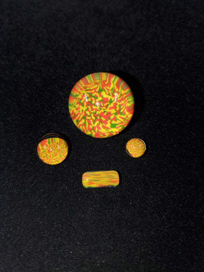 Close-up of the Millennium Glass Slurper Set, showcasing the handcrafted marble and terp pearls that improve airflow and filtration for smoother hits.