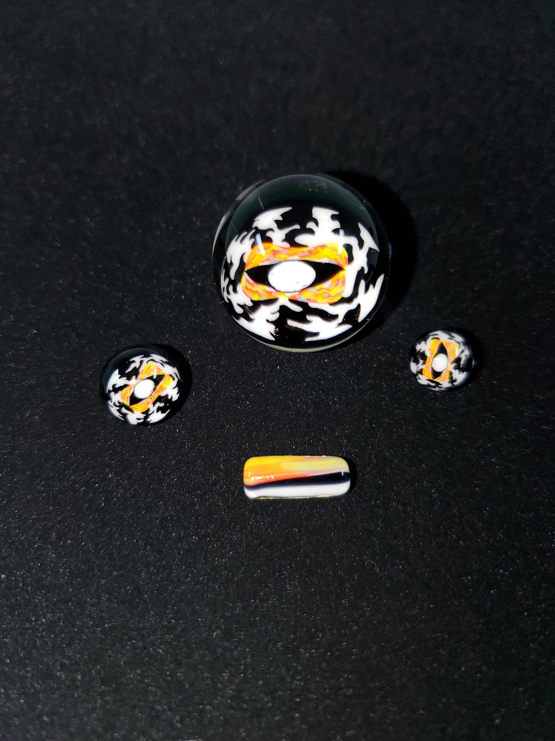 Close-up of the colorful terp slurper marble in the Millennium Glass Slurper Set, adding both beauty and functionality to your dabbing setup.