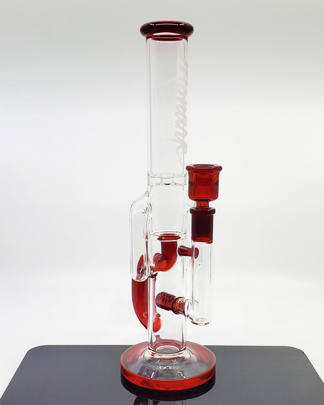 Side view of the Monark Glass 13" Color Accents Recycler (38mm), showcasing its durable design and vibrant color accents for a stylish and functional smoking piece.