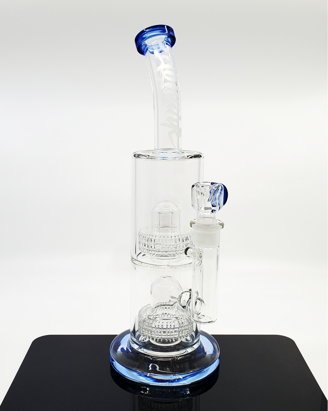 Monark Glass 75MM Double Decker Matrix Straight Tube in blue, featuring dual matrix percs, an 18MM 90-degree female joint, and an included 18MM slide for smooth filtration