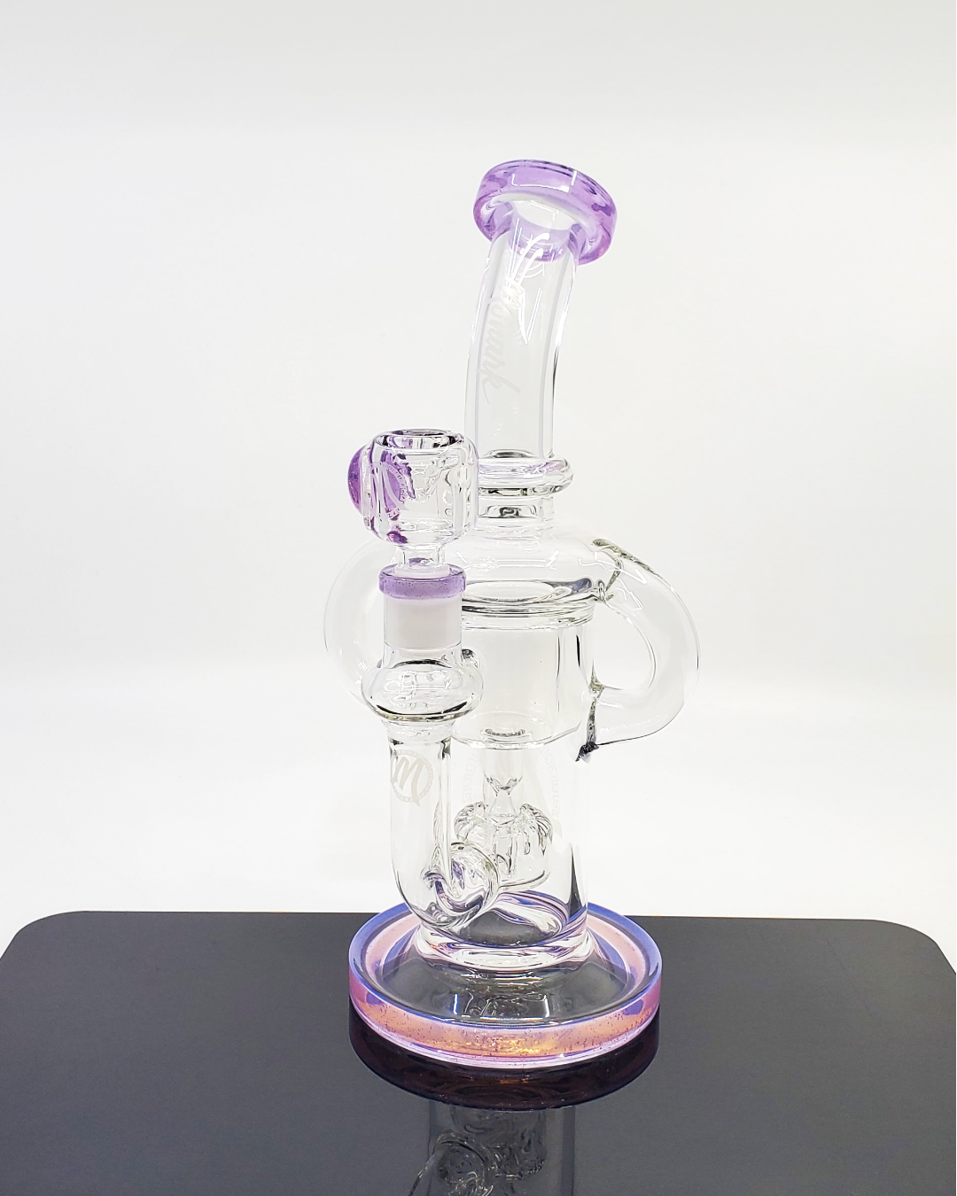 Monark Glass 9.5” Dual Uptake Circ Perc Rig featuring superior filtration and a stylish design for smooth hits. 