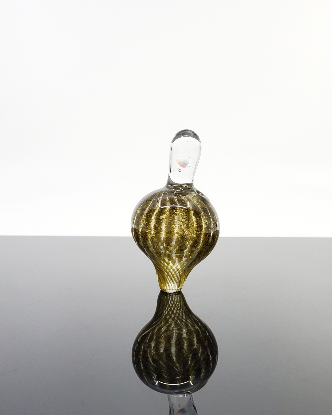  Side view of the Ninja Pancake Opal Bubble Cap, showcasing its vibrant opal accent and efficient airflow for an elevated dabbing experience.