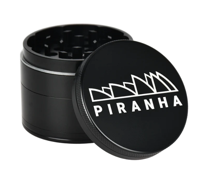 Piranha 2.2" 4-Piece Grinder, perfect for grinding herbs with a magnetic closure, sifting screen, and convenient canvas carry pouch.