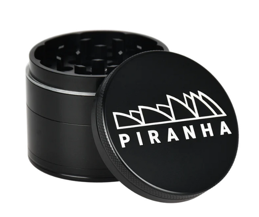 Piranha 2.2" 4-Piece Grinder, perfect for grinding herbs with a magnetic closure, sifting screen, and convenient canvas carry pouch.