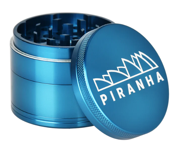 Piranha 2.2" 4-Piece Herb Grinder, with a magnetic closure, storage compartment, and sifting screen for efficient and easy use.