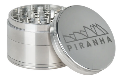 Piranha 2.5" 4-Piece Anodized Grinder, compact and efficient with a pollen chamber, sifting screen, and easy-to-grip friction ring.