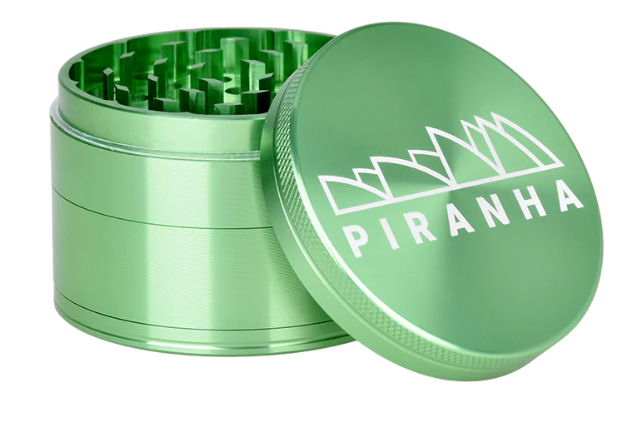 Piranha 2.5" 4-Piece Grinder, featuring a sifting screen and razor-sharp teeth, ideal for achieving the perfect shredded herb consistency.