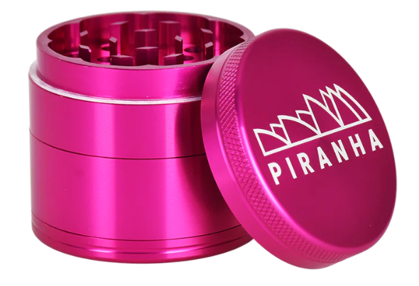 vPiranha 2" 4-Piece Grinder, the ideal herb grinding tool with magnetic closure and pollen chamber for an effortless experience.