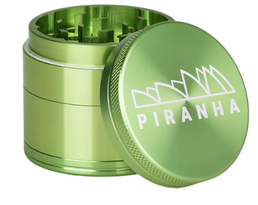 Piranha 2 Grinder with razor-sharp teeth, featuring a pollen chamber and sifting screen for high-quality herb grinding.