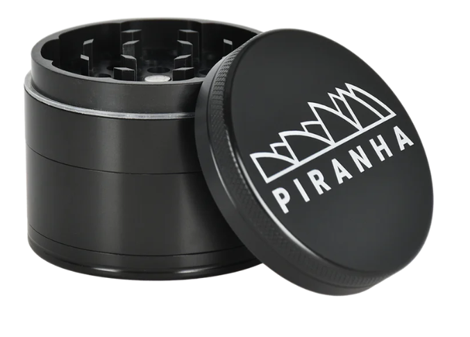 Piranha 4-Piece 2.2" Grinder, made from high-quality anodized aluminum for durability, featuring a magnetic closure and pollen chamber.