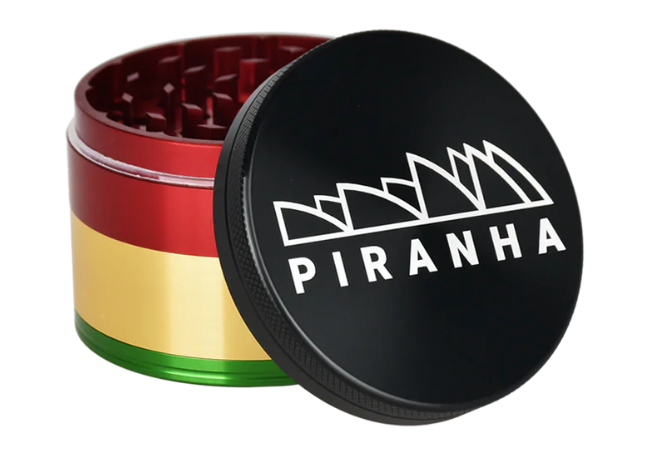 Piranha 4-Piece 2.5" Grinder, designed for smooth grinding with magnetic closure and built-in pollen chamber for herb storage.
