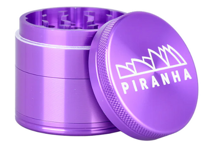  Piranha 4-Piece Grinder, 2-inch anodized aluminum with magnetic closure, built for efficient herb grinding and pollen collection.
