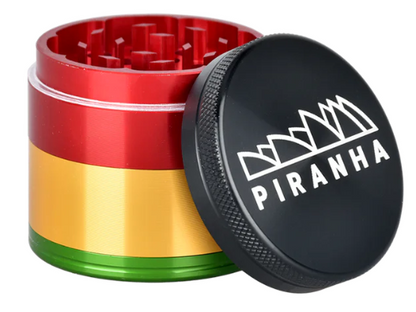 iranha Aluminum 4-Piece Grinder, 2" in diameter, featuring razor-sharp teeth and a pollen chamber for smooth herb grinding.