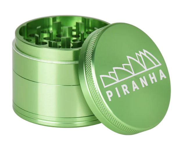 Piranha Anodized Aluminum 4-Piece 2.2" Grinder with magnetic closure and pollen chamber for easy herb storage and efficient grinding.