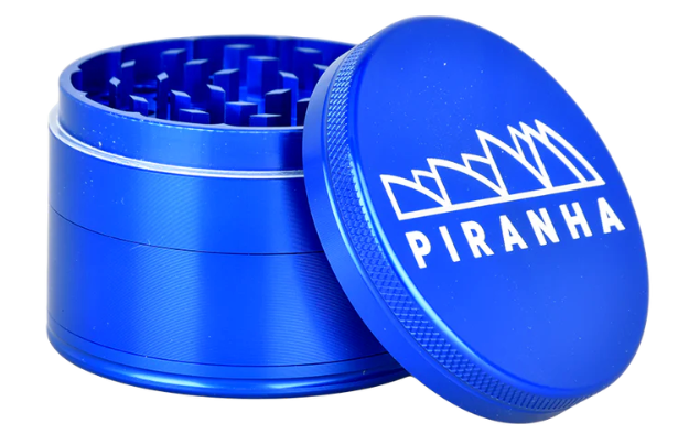Piranha Anodized Aluminum 4-Piece 2.5" Grinder, with a pollen chamber, magnetic closure, and durable build for high-quality grinding.
