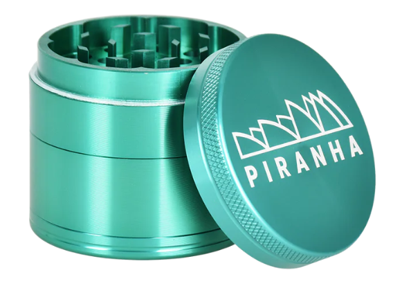 Piranha 4-Piece Herb Grinder, 2 inches wide, crafted from anodized aluminum for durability and smooth grinding performance.