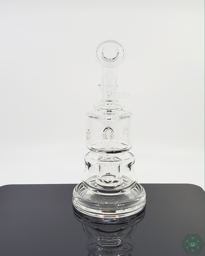 Durable PKG 60mm Puck Rig made from high-quality glass, featuring a stable base and superior airflow for seasoned concentrate users