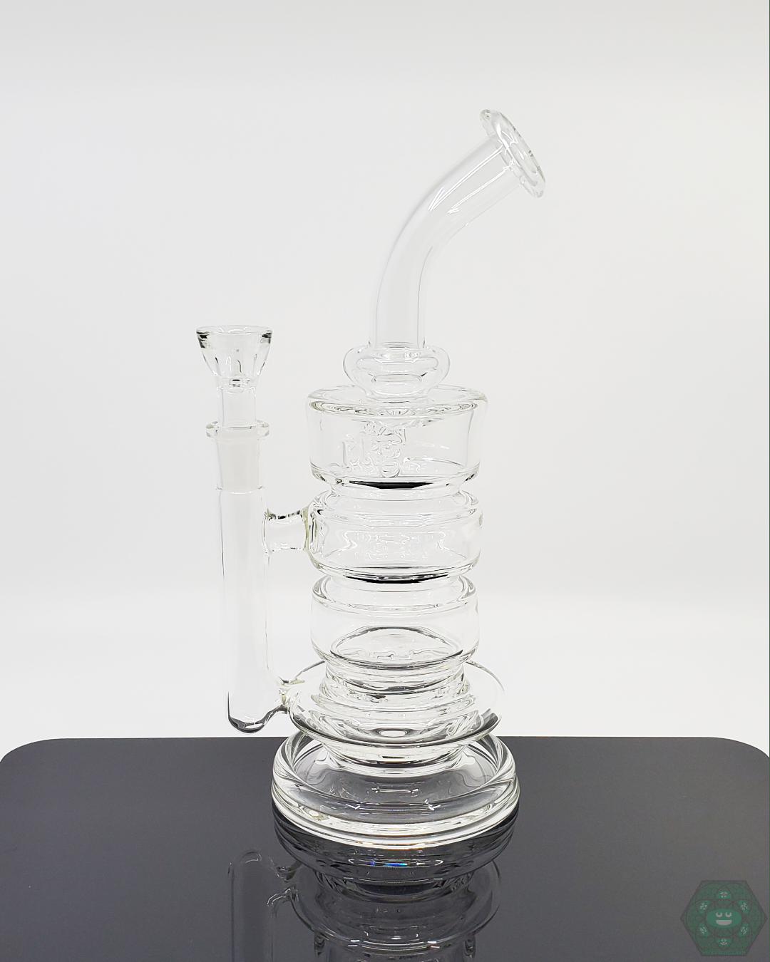 PKG 60mm Rig with dual 3-hole design, offering optimized airflow, smooth vapor pulls, and premium glass construction for durability