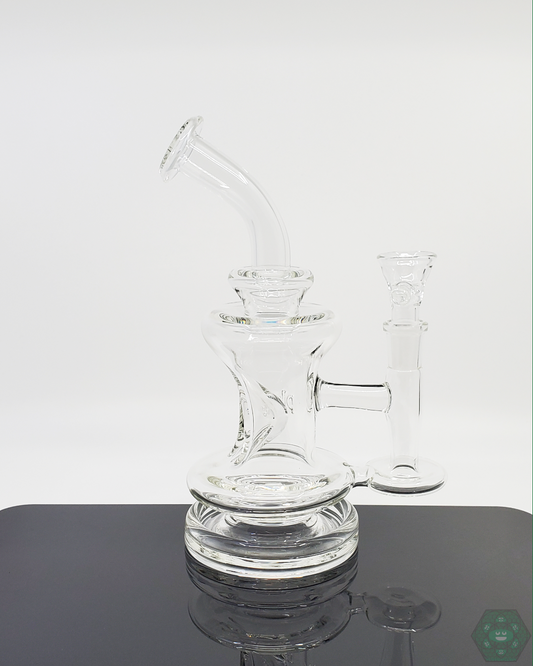 PKG Natural Glass Rig featuring a premium glass design, natural percolation for pure flavor, and a stable base for reliable dabbing sessions