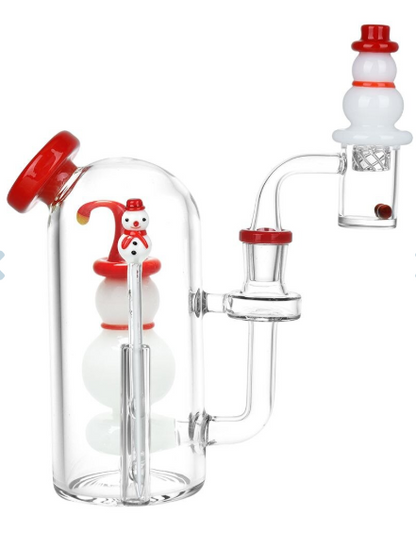 Pulsar Smiling Snowman Glass Dab Rig Set, 6 inches tall with a novelty snowman percolator, angled mouthpiece, and matching carb cap and dab tool.
