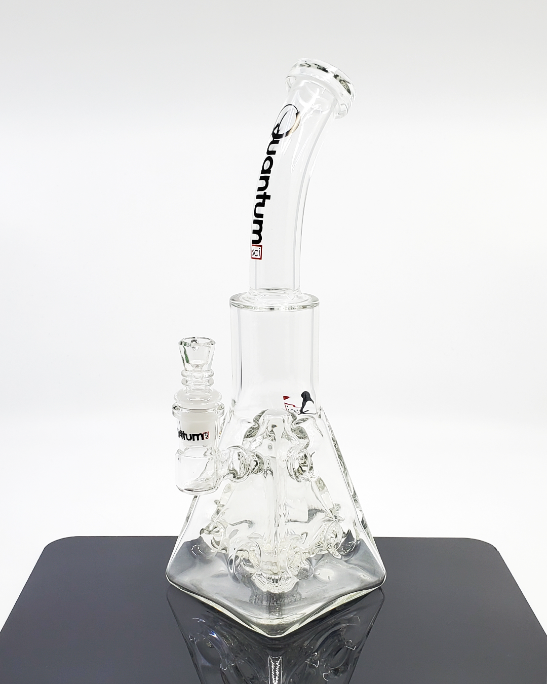  Side view of the Quantum Sci 12" Imperial Pyramid Beaker Bong, showcasing its striking design and high-quality glass construction for optimal performance.