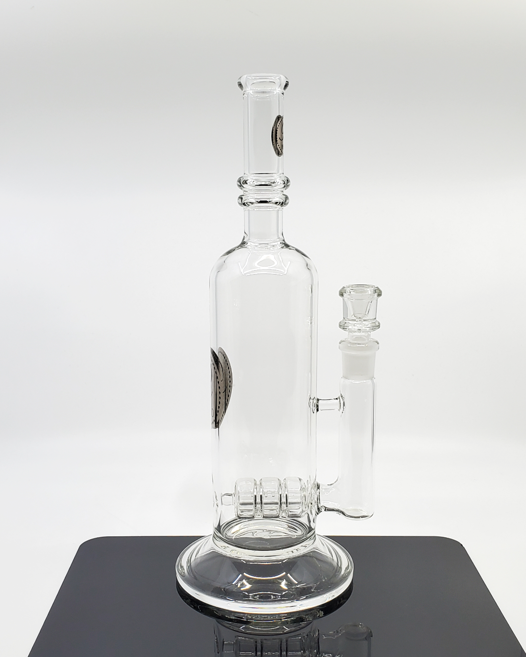Rehab Glass Clear Bottle Can Inline Beaker Bong – High-quality glass bong with a sleek bottle can shape, inline percolator, and built-in ice catcher for smooth, flavorful hits.