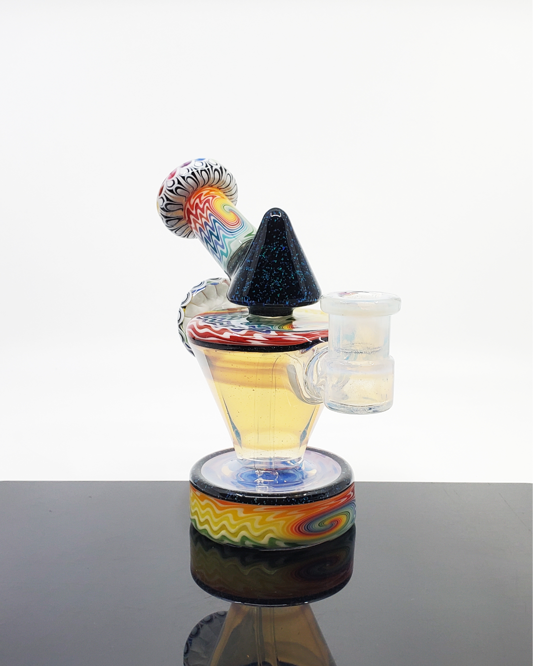 RL Dots Rainbow Talus Details: Close-up showcasing the vibrant rainbow-colored dot detailing and design of this 10mm dab rig, highlighting its unique aesthetic and functional design.