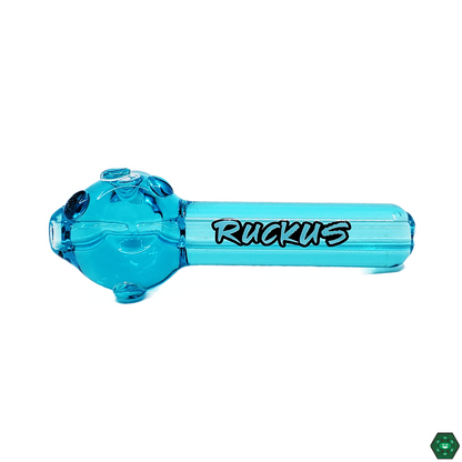  Ruckus Glass Glycerin Spoon displayed with smoking accessories, highlighting its sleek design and cooling effect for a premium smoking experience.