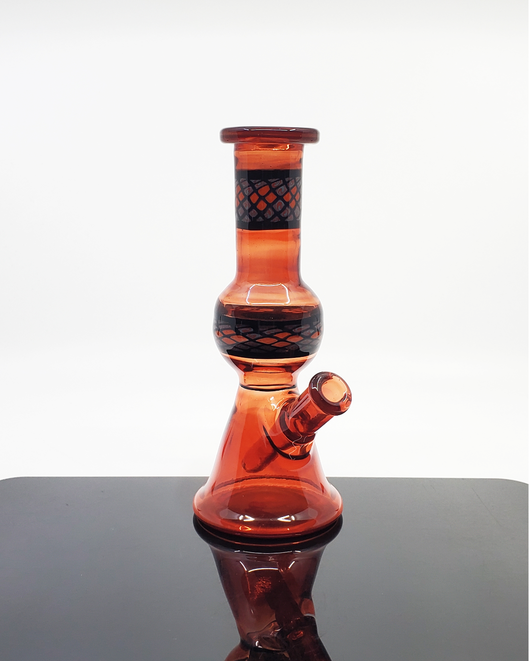 Shipley Glass EXP Blood Red Jammer, a striking limited edition 10mm glass rig with a deep red hue, blending functionality with eye-catching design, making it a unique choice for heady glass collectors.