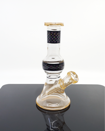 Shipley Glass Peach Faceted Jammer, a handcrafted 10mm peach dab rig offering both a stylish peach tint and a unique faceted design, crafted for enthusiasts who appreciate high-quality and aesthetic glasswork