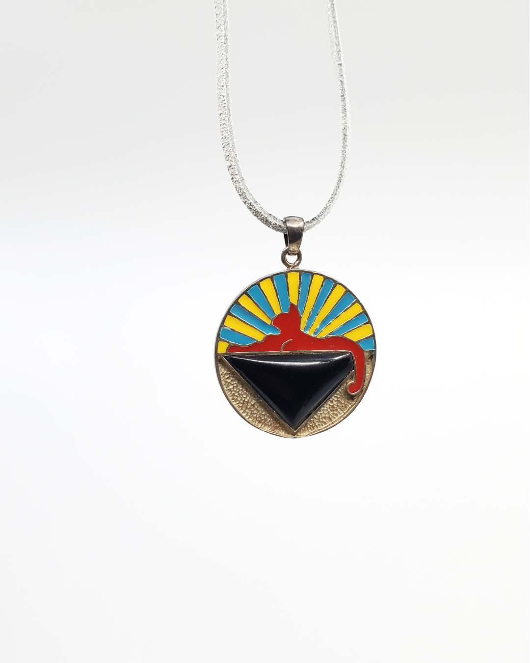 Silver GDF Spynx Pendant featuring a handcrafted glass design, perfect for art collectors and jewelry enthusiasts seeking unique, detailed craftsmanship.