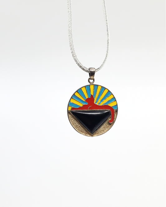 Silver GDF Spynx Pendant featuring a handcrafted glass design, perfect for art collectors and jewelry enthusiasts seeking unique, detailed craftsmanship.