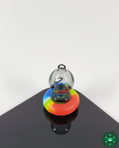  Angled view of the Spacewalk Glass Puffco Peak Caps, showing off its unique design, perfect for maximizing airflow during dabbing sessions.