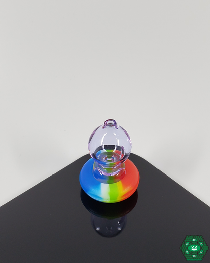 Spacewalk Glass Puffco Peak Caps being cleaned, showcasing their easy-to-maintain design and durable material for hassle-free use.