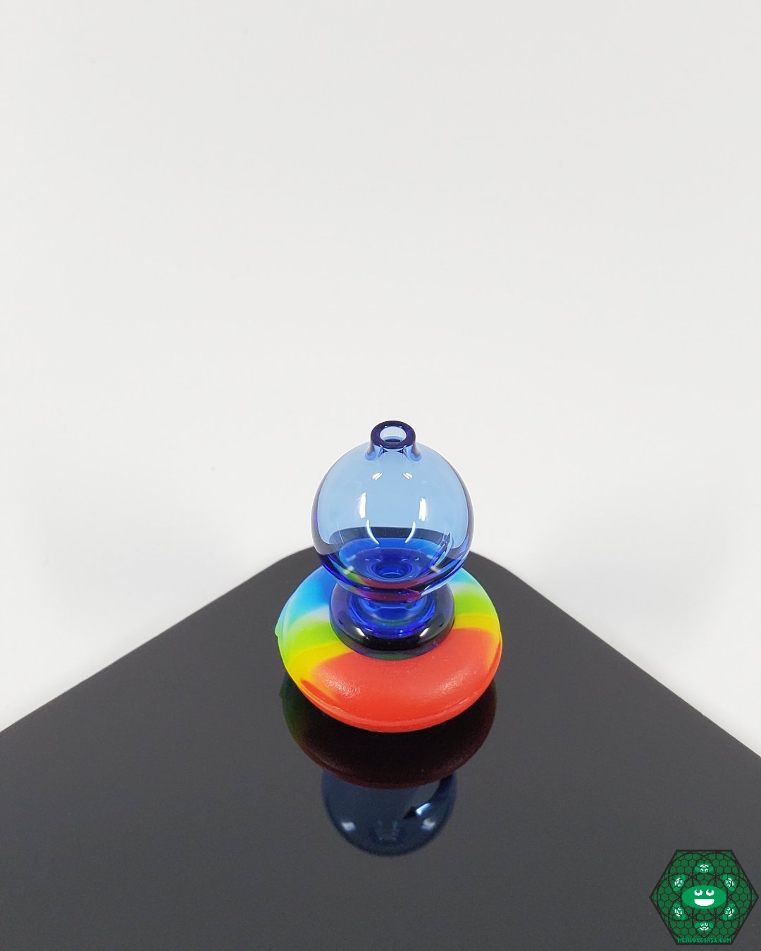Close-up of the Spacewalk Glass Puffco Peak Caps, highlighting the high-quality borosilicate glass and precise craftsmanship for better heat retention and smoother hits.