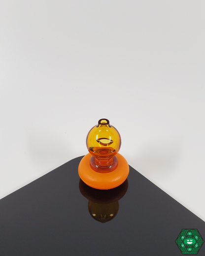  Display of Spacewalk Glass Puffco Peak Caps, designed for Puffco Peak devices, offering superior airflow and flavor for an optimal dabbing experience.