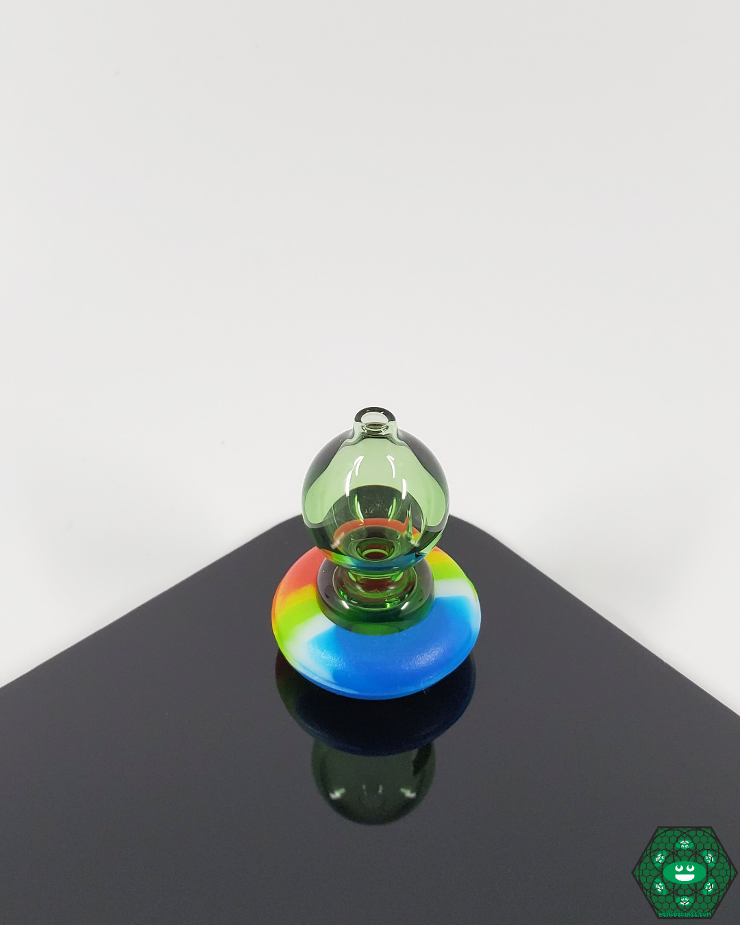  Spacewalk Glass Puffco Peak Caps on a Puffco Peak device, illustrating their perfect fit and ability to improve airflow and heat retention for enhanced flavor.