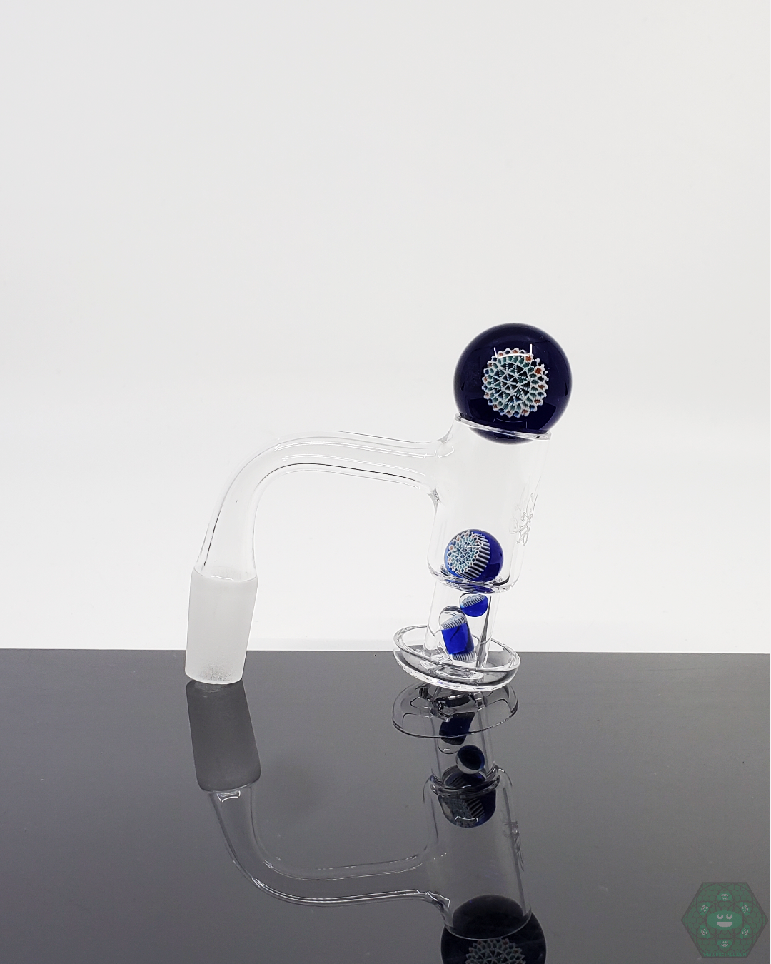 Steve H Glass Premium Slurper Set for 20-25mm nails, providing a vapor and flavor boost with intricate design and terp valve functionality.