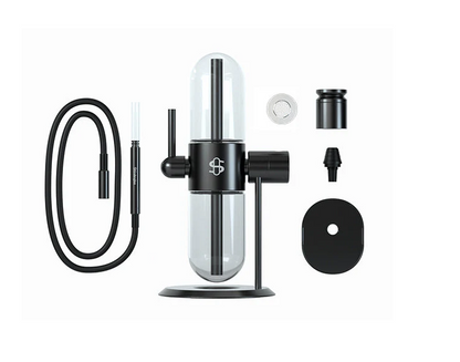 Full setup of the Stündenglass Gravity Infuser in black, including the bowl kit, glass liner, and silicone hose for versatile use.