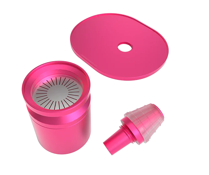 Close-up of the built-in percolation system in the pink Stündenglass Gravity Infuser, delivering water-filtered, cooled smoke.