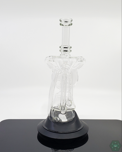 Demonstrating the Swiss Recycler attachment on a Puffco, enhancing the vapor cooling and filtration process.