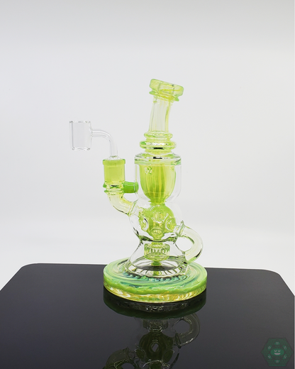  Close-up of the TAG 8.2" Faberge Egg Incycler, showcasing its intricate Klein-style design and superior glass quality for enhanced filtration and performance.