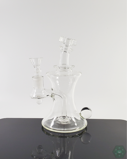 TAG Glass 7.5” Flask-style water pipe featuring premium smooth filtration and a 14mm joint for a refined smoking experience.